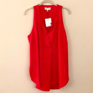 Sleeveless tunic snap front L